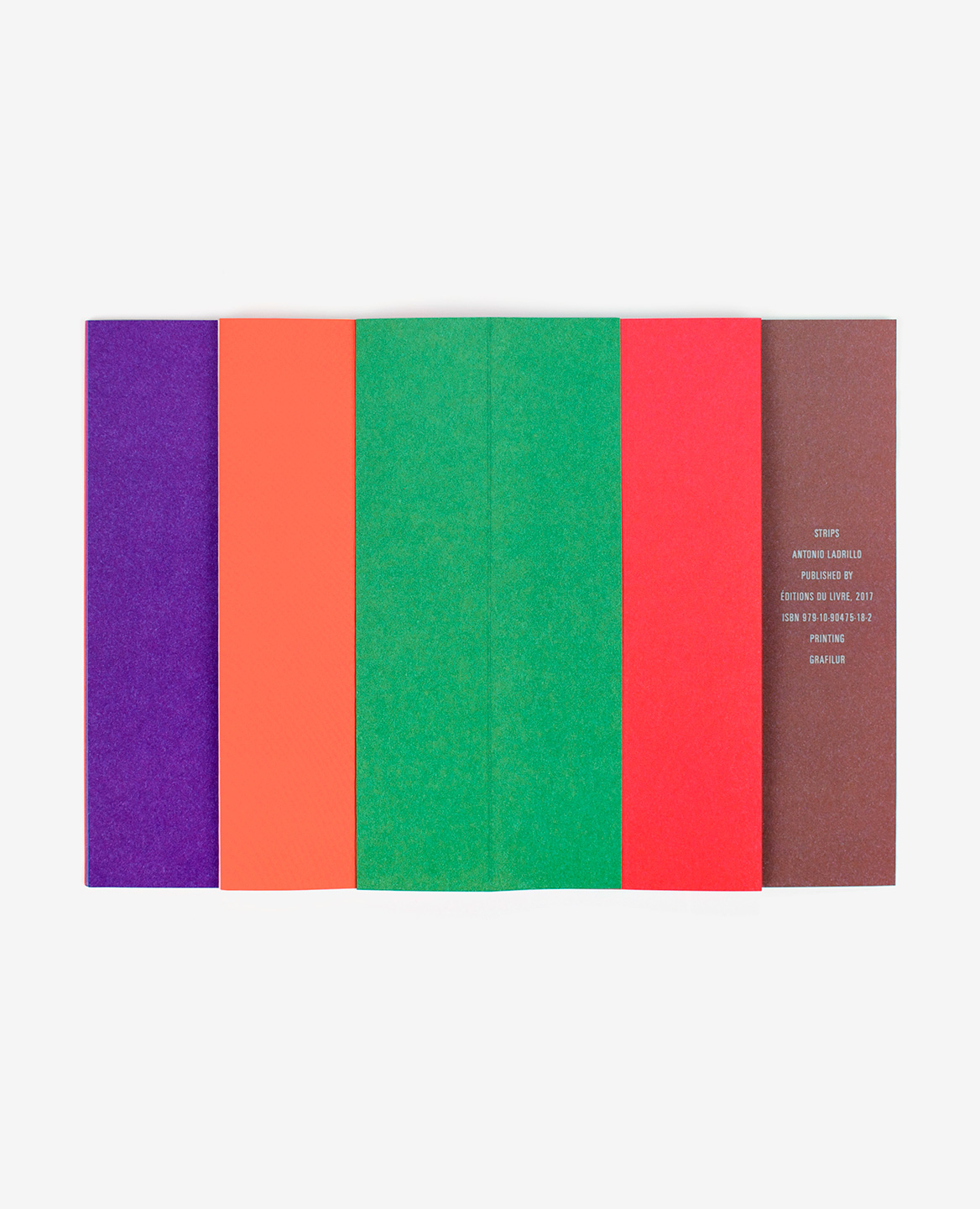 Violet, orange, green, red and brown strips in the book Strips